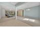 Bright dining room with tile and carpeted floors, and access to the kitchen and living areas at 12176 Se 91St Ave, Summerfield, FL 34491