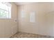 Simple laundry room with washer/dryer hookups and a window at 4422 Cr 690, Webster, FL 33597