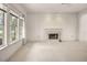 Living room with fireplace and large windows at 29334 David Ct, Tavares, FL 32778