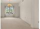 Spacious dining room featuring a chandelier and window view at 29334 David Ct, Tavares, FL 32778