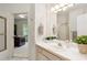 Bathroom with single sink vanity and shower at 29334 David Ct, Tavares, FL 32778