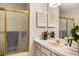 Clean bathroom with a shower/tub combo and updated vanity at 29334 David Ct, Tavares, FL 32778
