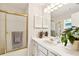 Clean bathroom with a shower/tub combo and updated vanity at 29334 David Ct, Tavares, FL 32778