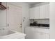 Laundry room with washer, dryer, and utility sink at 29334 David Ct, Tavares, FL 32778