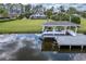 Stunning aerial view of waterfront property with boat dock at 29334 David Ct, Tavares, FL 32778