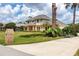 Two-story home with a brick facade and well-manicured lawn at 29334 David Ct, Tavares, FL 32778