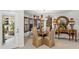 Elegant dining room with ornate furniture and natural light at 122 Baytree Blvd, Tavares, FL 32778