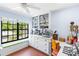 Spacious craft room, abundant built-in storage, and large window at 122 Baytree Blvd, Tavares, FL 32778
