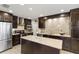 Modern kitchen with granite countertops and stainless steel appliances at 122 Baytree Blvd, Tavares, FL 32778