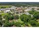 Wide aerial view of the property and surroundings at 304 E Noble Ave, Bushnell, FL 33513