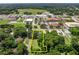 Aerial view showing a lot's location near buildings at 304 E Noble Ave, Bushnell, FL 33513