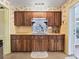 Kitchen featuring wood cabinets and a butcher block countertop at 304 E Noble Ave, Bushnell, FL 33513