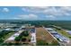 Aerial view of property and surrounding agricultural land at 2103 W Kelly Park Rd, Apopka, FL 32712