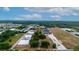 Aerial view of a rectangular lot near greenhouses at 2103 W Kelly Park Rd, Apopka, FL 32712