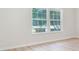 Light and bright living area with large windows and neutral walls at 24801 Cranes Roost Cir, Leesburg, FL 34748