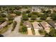 Aerial view of a quiet residential street with houses at 24801 Cranes Roost Cir, Leesburg, FL 34748