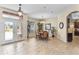 Bright dining room with tile floors and access to the backyard at 10710 Sw 49Th Ave, Ocala, FL 34476