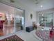 Sunroom with view into the living area at 1751 Ashwood Run, The Villages, FL 32162