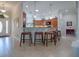 Kitchen island with seating for four and a breakfast bar at 1751 Ashwood Run, The Villages, FL 32162