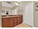 Bathroom with double vanity and modern fixtures at 1000 Glenraven Ln, Clermont, FL 34711