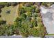 Aerial view of wooded lot at 26711 County Road 33, Groveland, FL 34736