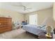 Bright bedroom featuring a dresser and ceiling fan at 2198 Se 110Th Ave, Webster, FL 33597