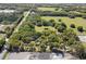 Aerial view of property showing land and trees at 26711 County Road 33, Groveland, FL 34736