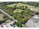 Aerial view of property with road and surrounding land at 26711 County Road 33, Groveland, FL 34736