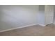 Spacious bedroom with tile floor and closet at 1100 E Caroline St # 115, Tavares, FL 32778