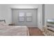 Bright bedroom with double windows, carpeted floor, and plenty of space at 9342 Oglethorpe Dr, Groveland, FL 34736