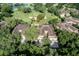 Aerial view of homes near golf course at 33 Camino Real # 303, Howey In The Hills, FL 34737