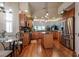 Modern kitchen with stainless steel appliances and island at 33 Camino Real # 303, Howey In The Hills, FL 34737