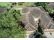 Aerial view of home with tile roof at 33 Camino Real # 303, Howey In The Hills, FL 34737