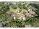 Aerial view of homes and golf course at 33 Camino Real # 303, Howey In The Hills, FL 34737