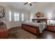 Large main bedroom with wood flooring and a tranquil atmosphere at 33 Camino Real # 303, Howey In The Hills, FL 34737