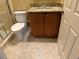 Clean bathroom with granite countertop and updated fixtures at 33 Camino Real # 303, Howey In The Hills, FL 34737