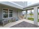 Front porch with seating area and view of neighborhood at 16388 Hamlin View St, Winter Garden, FL 34787