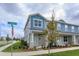 Two-story townhome with light blue siding at 16388 Hamlin View St, Winter Garden, FL 34787