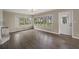 Dining room with hardwood floors and lake views at 1261 W Lakeshore Dr, Clermont, FL 34711