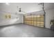 Spacious garage with automatic door opener and ample storage at 1261 W Lakeshore Dr, Clermont, FL 34711