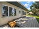 Lakefront home with a deck and lovely backyard at 1261 W Lakeshore Dr, Clermont, FL 34711