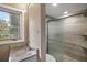 Renovated bathroom includes a granite vanity and updated shower at 1261 W Lakeshore Dr, Clermont, FL 34711