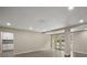 Bright living room with hardwood floors and access to backyard at 1261 W Lakeshore Dr, Clermont, FL 34711