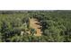 Aerial view of property and surrounding area at 3554 County Road 216, Oxford, FL 34484