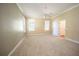 Spacious bedroom with neutral walls and carpet flooring at 3554 County Road 216, Oxford, FL 34484