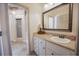 Bathroom with vanity, sink, and shower at 3554 County Road 216, Oxford, FL 34484