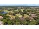 Aerial view of homes situated near golf course at 23 Camino Real Blvd # 23, Howey In The Hills, FL 34737