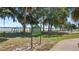 Community park with playground, exercise equipment and lake view at 23 Camino Real Blvd # 23, Howey In The Hills, FL 34737
