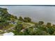 Aerial view of lakefront properties and residential neighborhood at 23 Camino Real Blvd # 23, Howey In The Hills, FL 34737