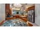 Well-equipped kitchen with granite countertops and stainless steel appliances at 23 Camino Real Blvd # 23, Howey In The Hills, FL 34737